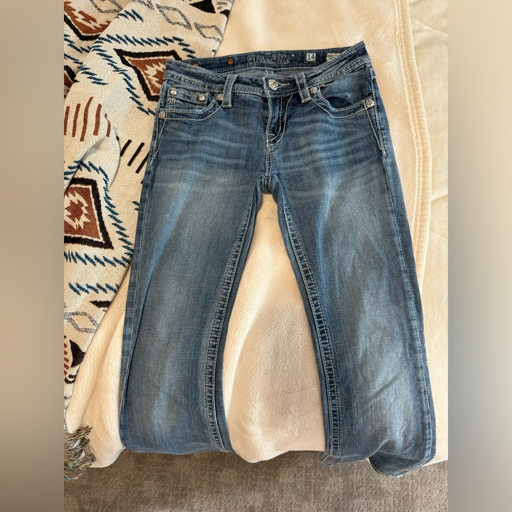 Miss Me Bootcut Low Rise Jeans.